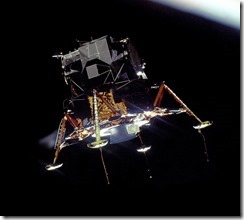 Apollo_11_Lunar_Module_Eagle_in_landing_configuration_in_lunar_orbit_from_the_Command_and_Service_Module_Columbia